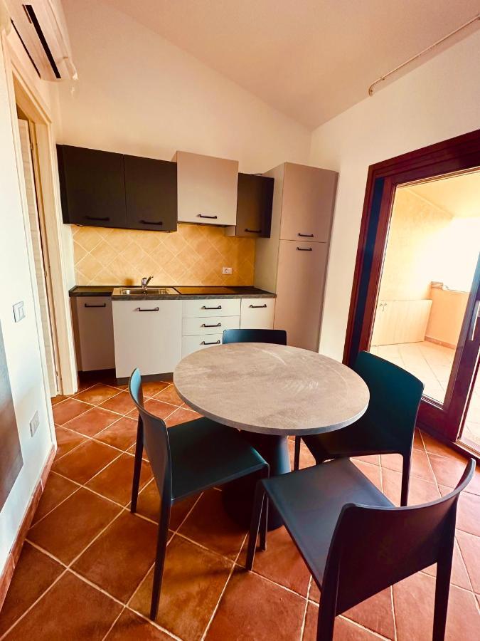 Rocce Rosse Sardinia Aparthotel Isola Rossa Bagian luar foto