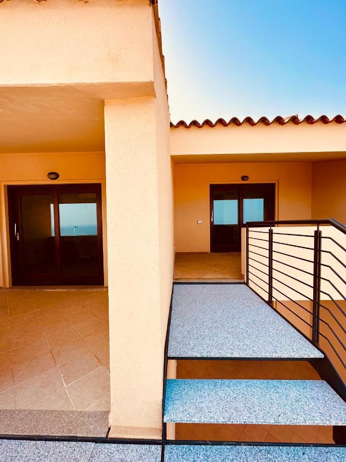 Rocce Rosse Sardinia Aparthotel Isola Rossa Bagian luar foto
