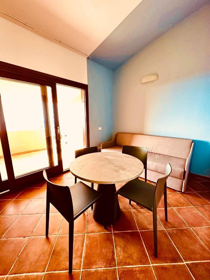 Rocce Rosse Sardinia Aparthotel Isola Rossa Bagian luar foto