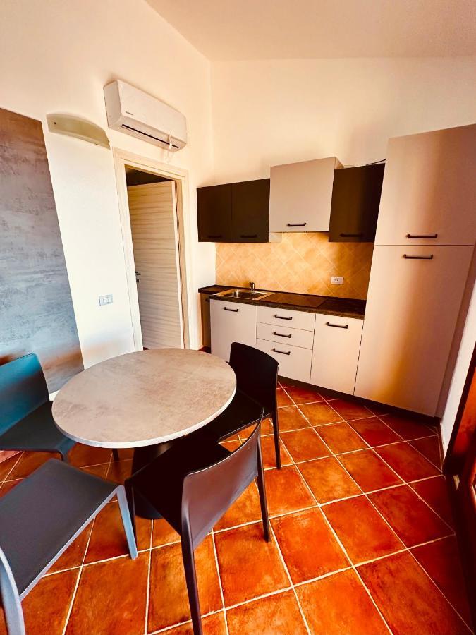 Rocce Rosse Sardinia Aparthotel Isola Rossa Bagian luar foto