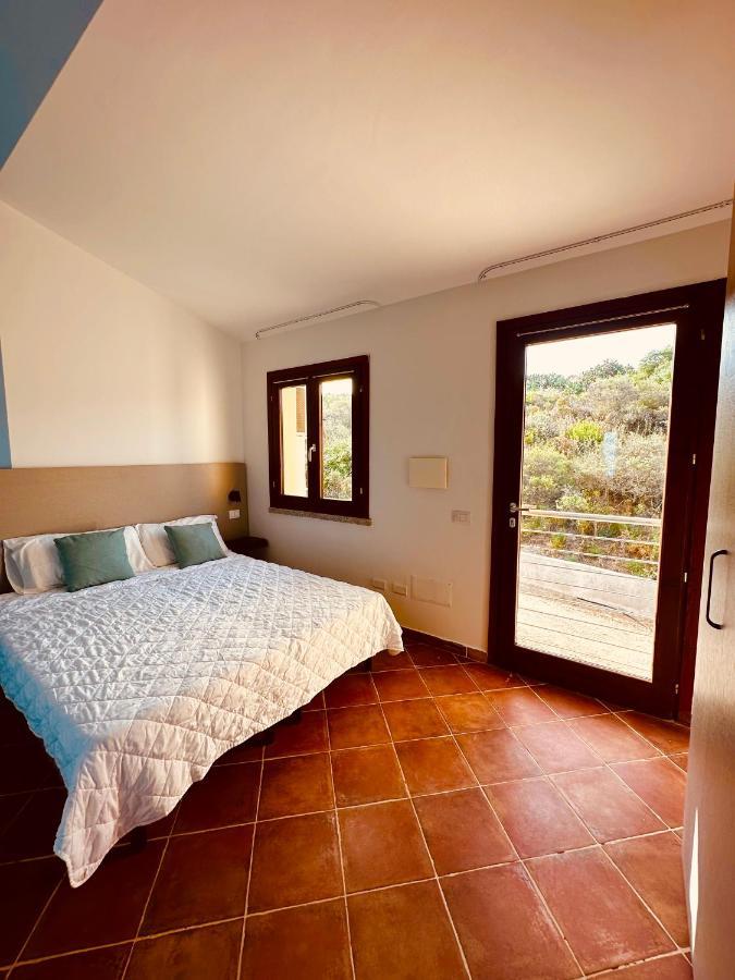 Rocce Rosse Sardinia Aparthotel Isola Rossa Bagian luar foto