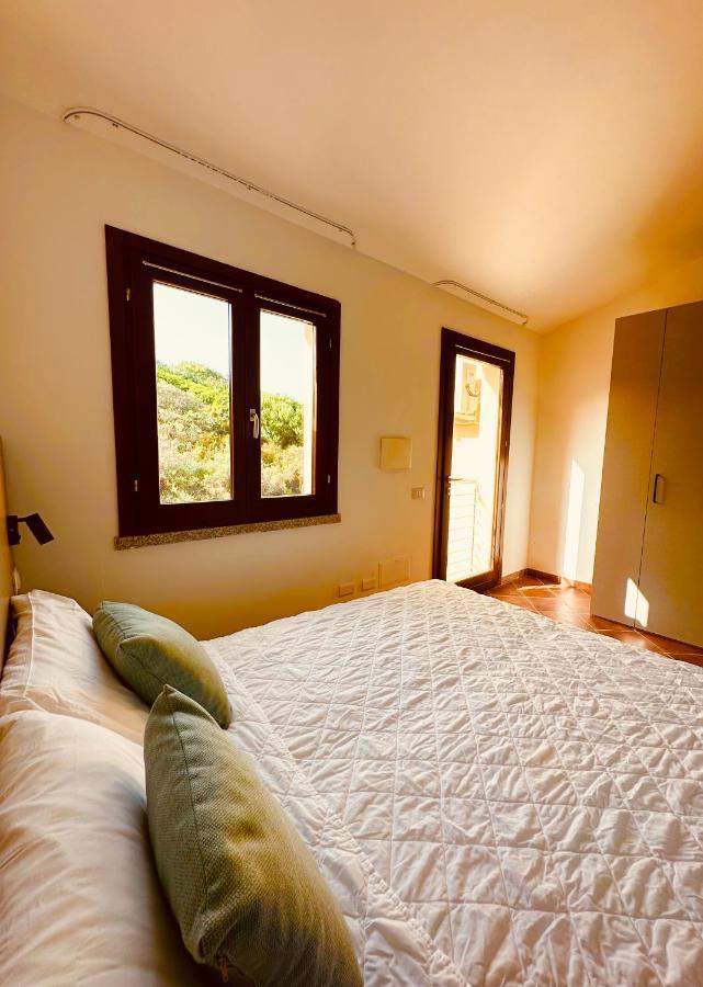 Rocce Rosse Sardinia Aparthotel Isola Rossa Bagian luar foto