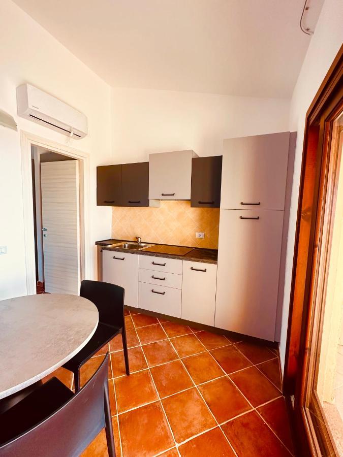 Rocce Rosse Sardinia Aparthotel Isola Rossa Bagian luar foto