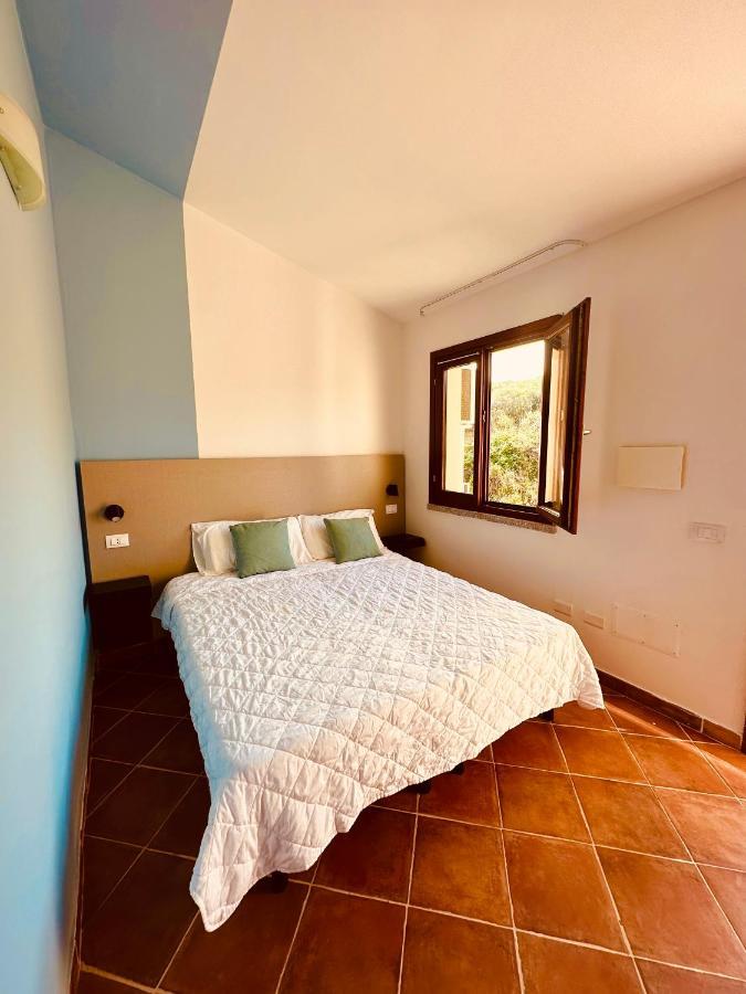 Rocce Rosse Sardinia Aparthotel Isola Rossa Bagian luar foto