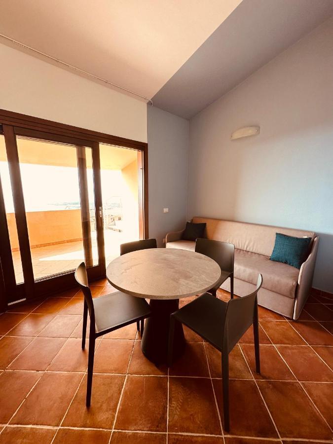 Rocce Rosse Sardinia Aparthotel Isola Rossa Bagian luar foto