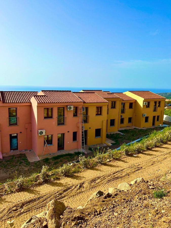 Rocce Rosse Sardinia Aparthotel Isola Rossa Bagian luar foto