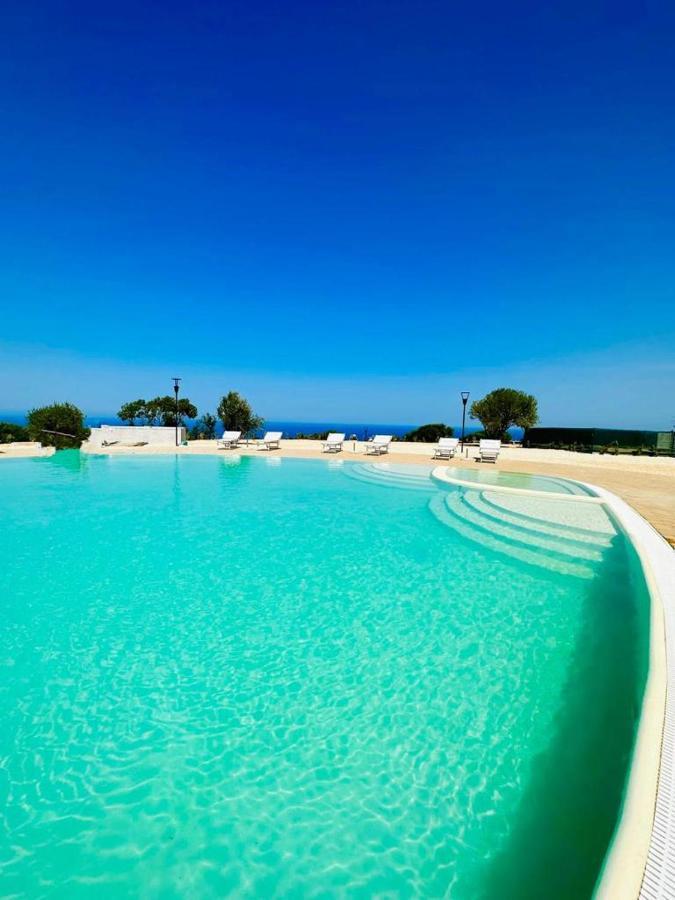 Rocce Rosse Sardinia Aparthotel Isola Rossa Bagian luar foto