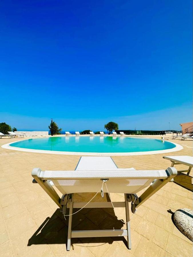 Rocce Rosse Sardinia Aparthotel Isola Rossa Bagian luar foto