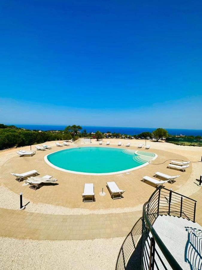 Rocce Rosse Sardinia Aparthotel Isola Rossa Bagian luar foto